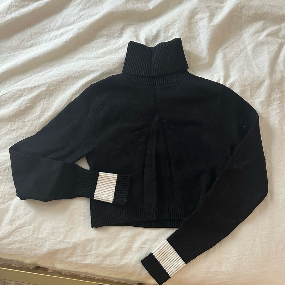 Black Turtleneck Sweater with White Accents